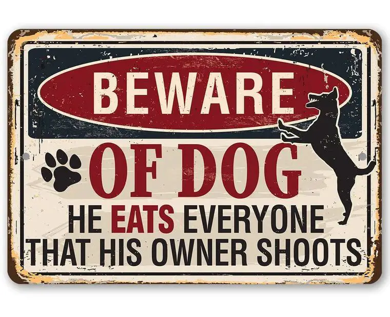 a 'beware of dog' sign in front of a restaurant