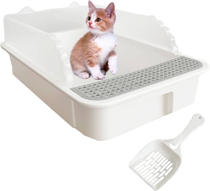 a cat litter box with litter spilling over the side.