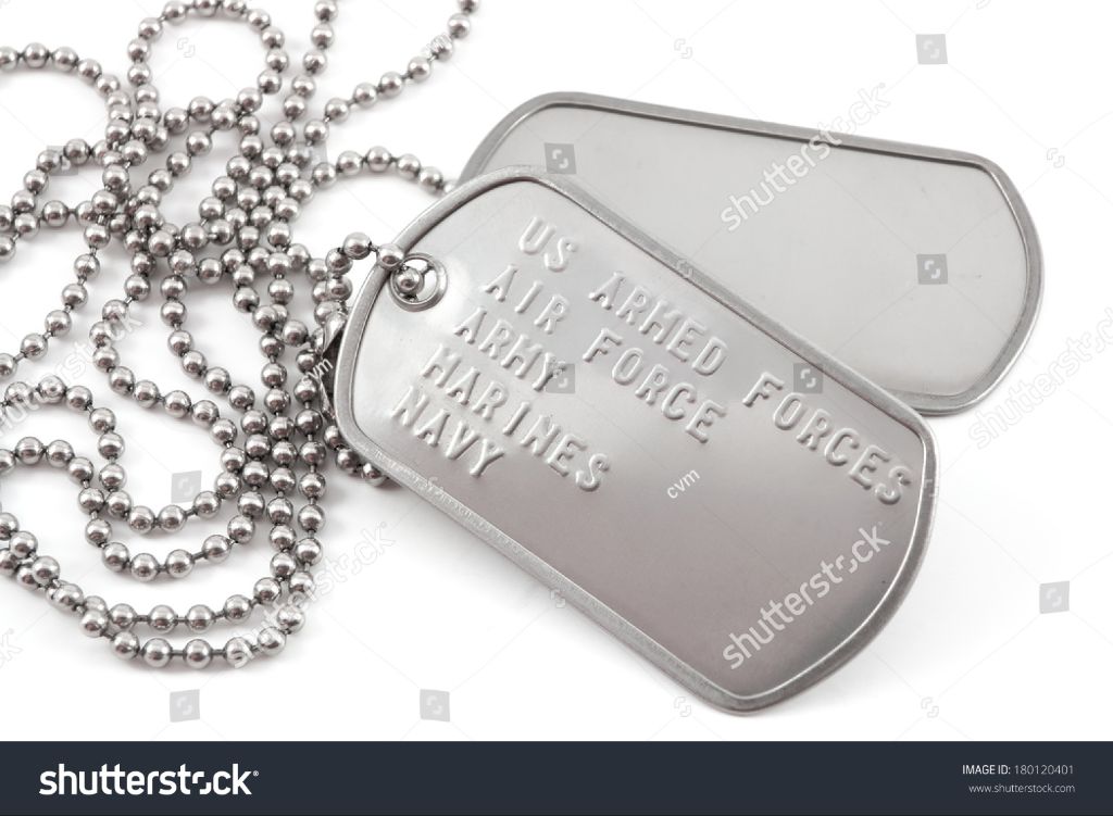 a close up photo of air force dog tags