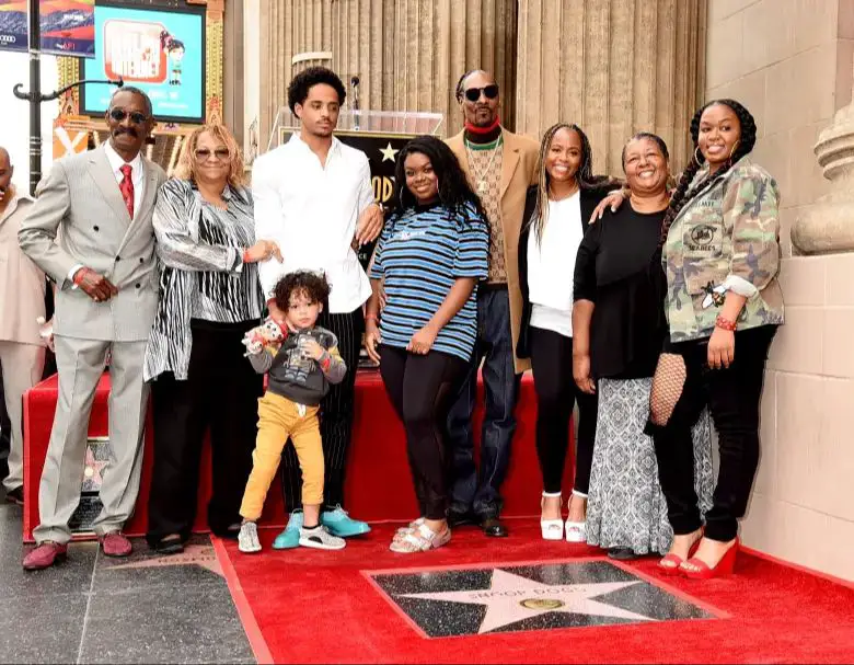 an image of corde broadus with his wife and children