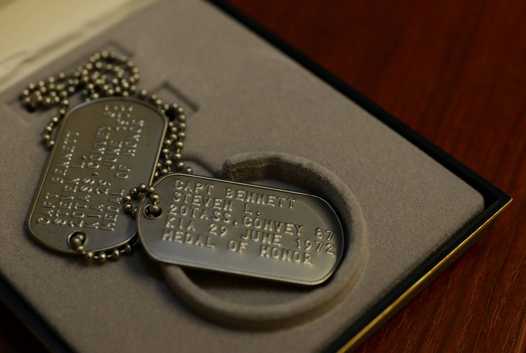 dog tags stamped with different military branch names