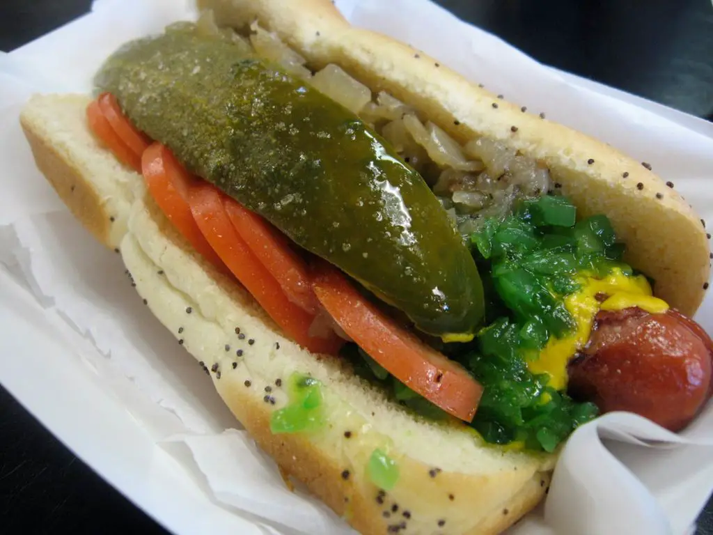 the famous chicago-style hot dog loaded with toppings.