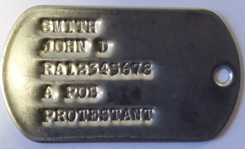 vintage military dog tags showing a full 9-digit social security number.